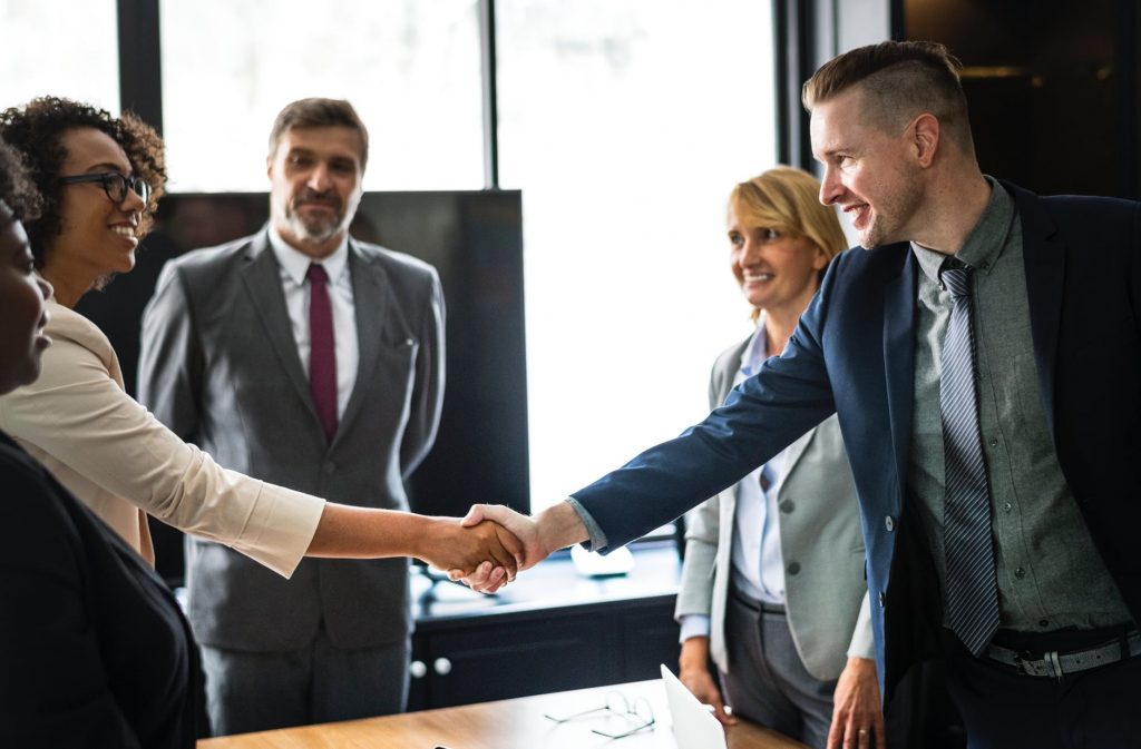 professional business people shaking hands.